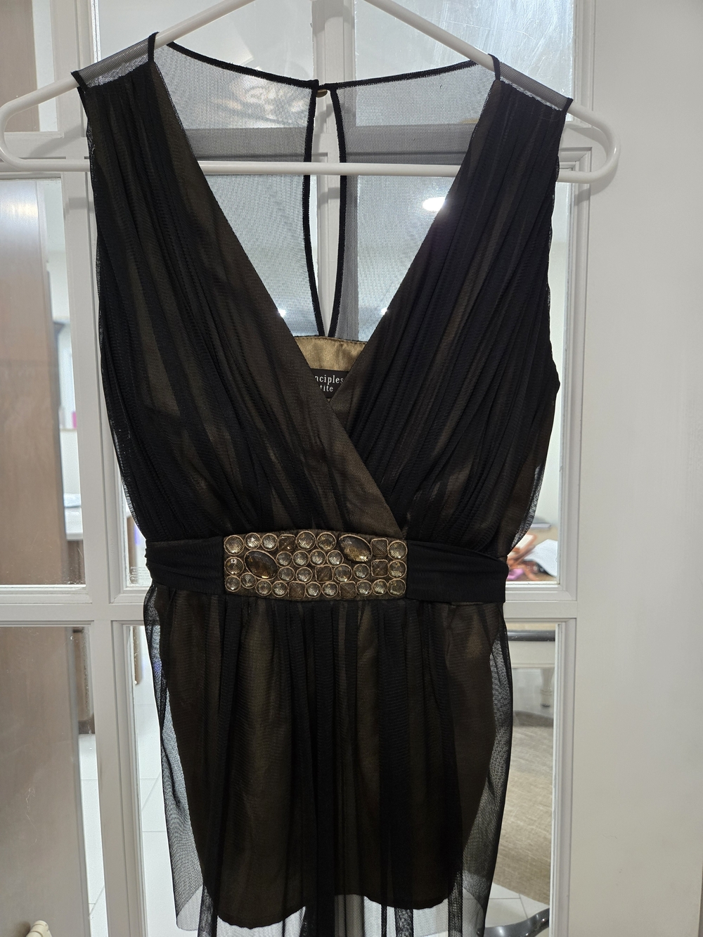 Elegant Black Sheer V‑Neck Blouse with Jeweled Waist
